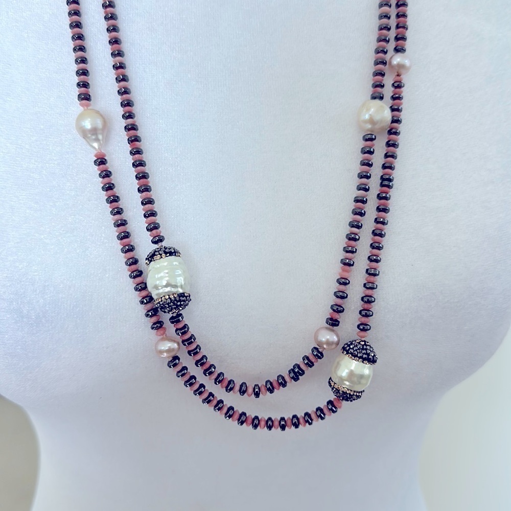 Long beaded necklace 28” long. Gray and pink beads  and pearl beads